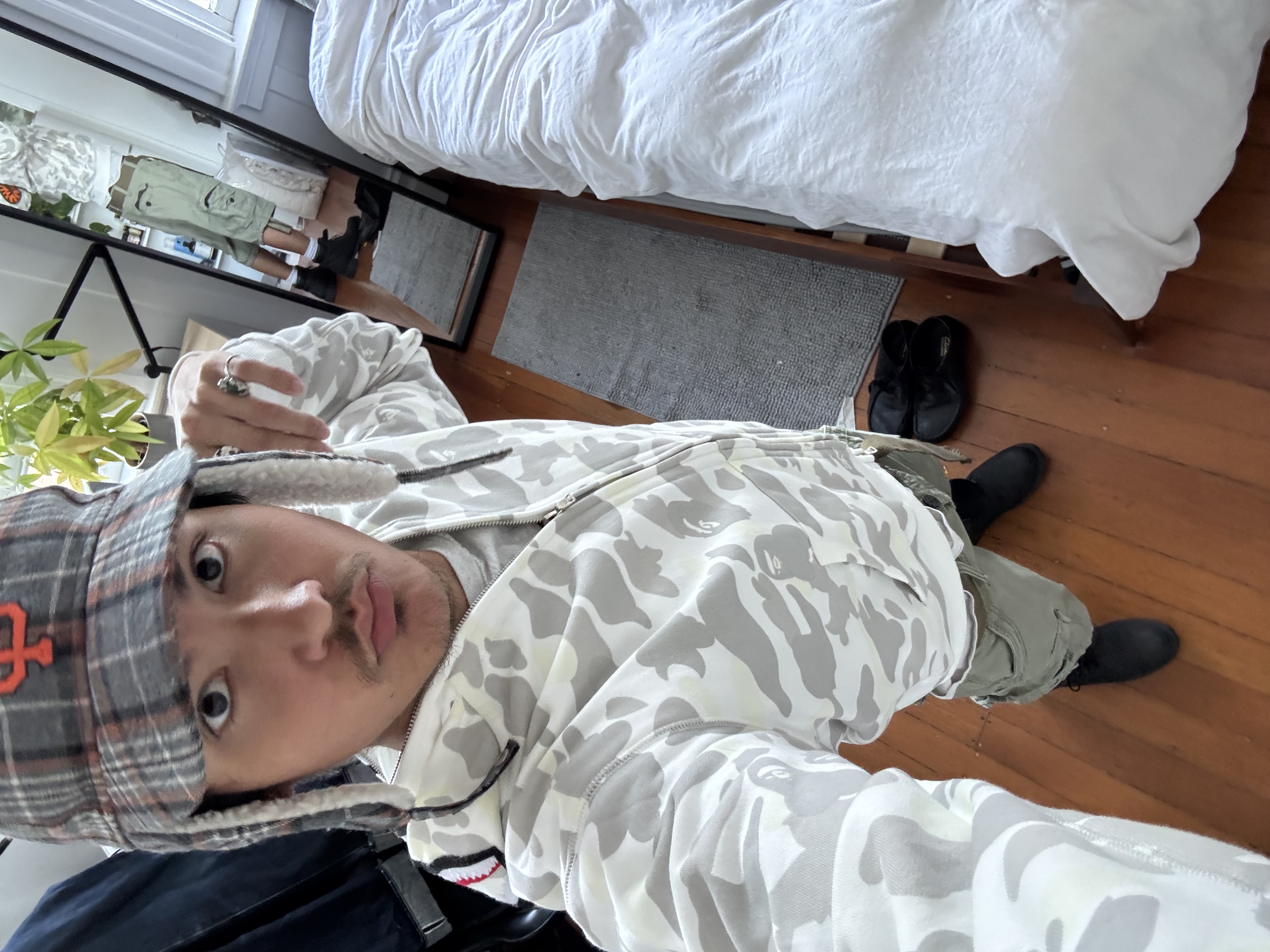 omar in a bape hoodie