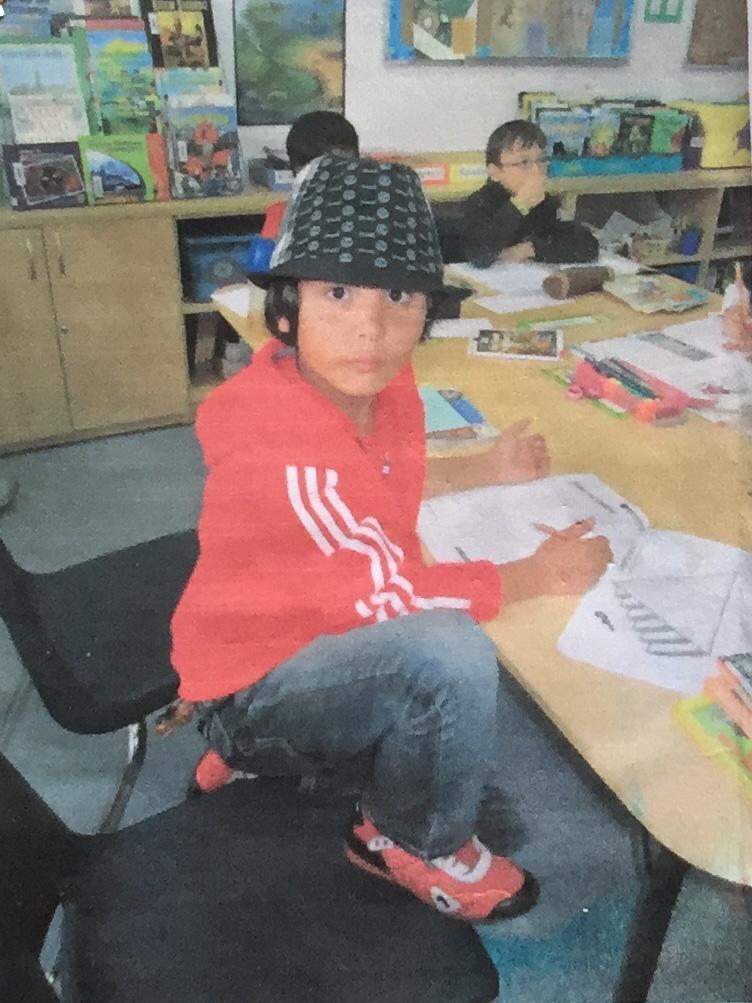 baby omar in red hoodie and red ferarri shoes